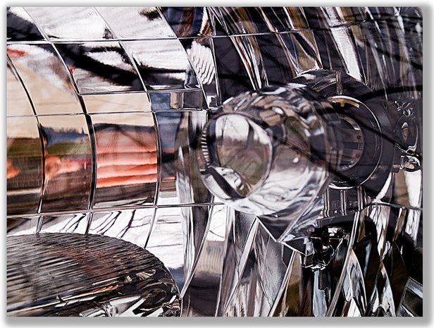 Photograph of the many reflections in a car headlight